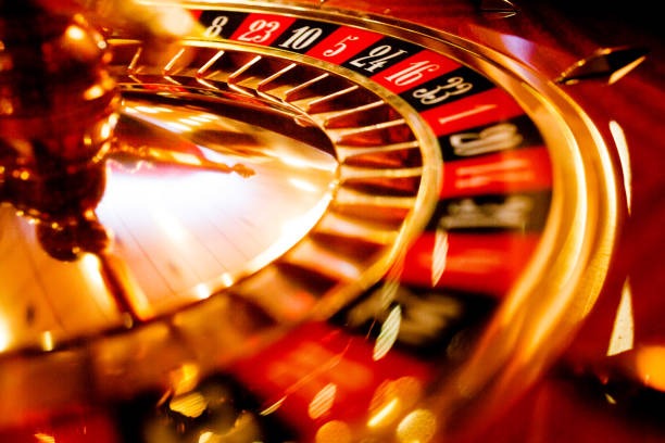 Roulette wheel spinning with ball in motion